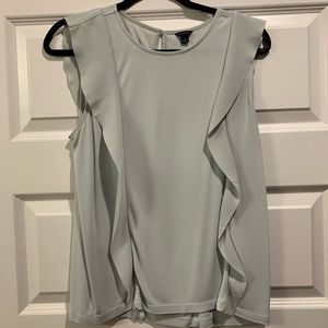 Light mint green blouse with ruffles